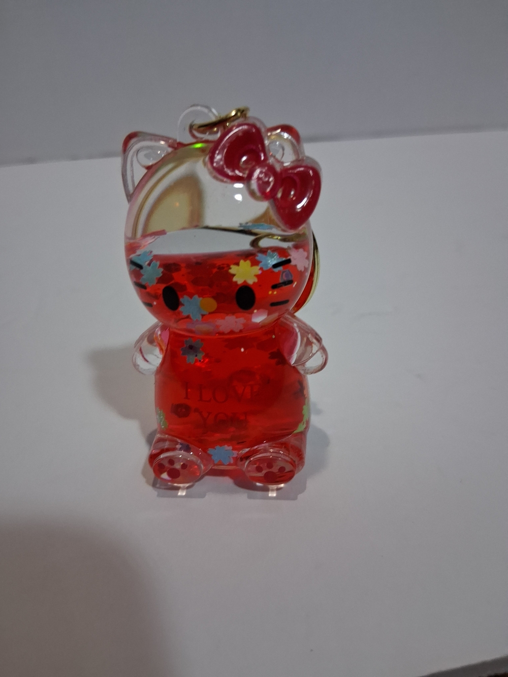 Red Cat Shaped Liquid Keychain Toy with Flower Confetti